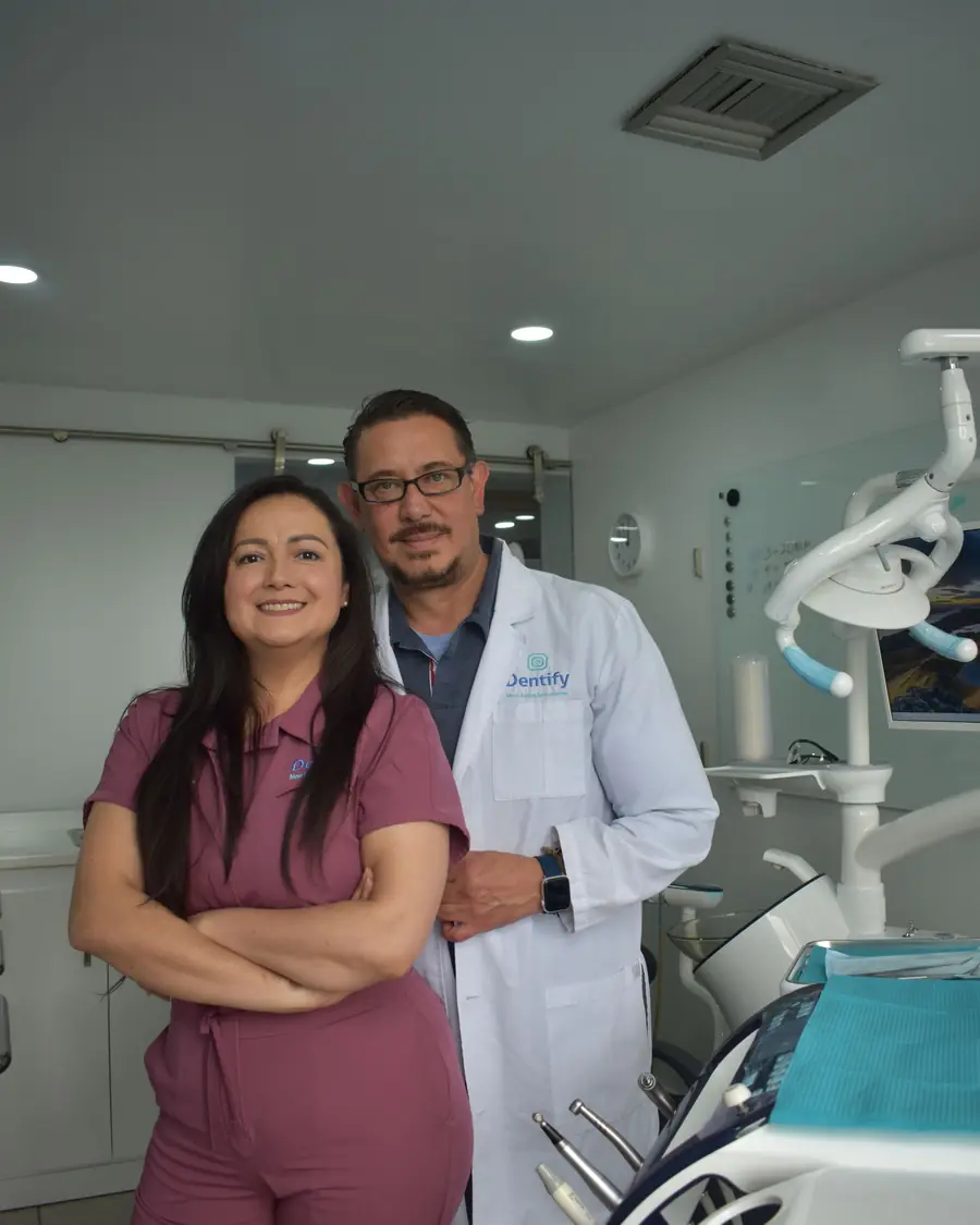 Dr. Irina Maftei and Dr. Dan Maftei standing in their clinic